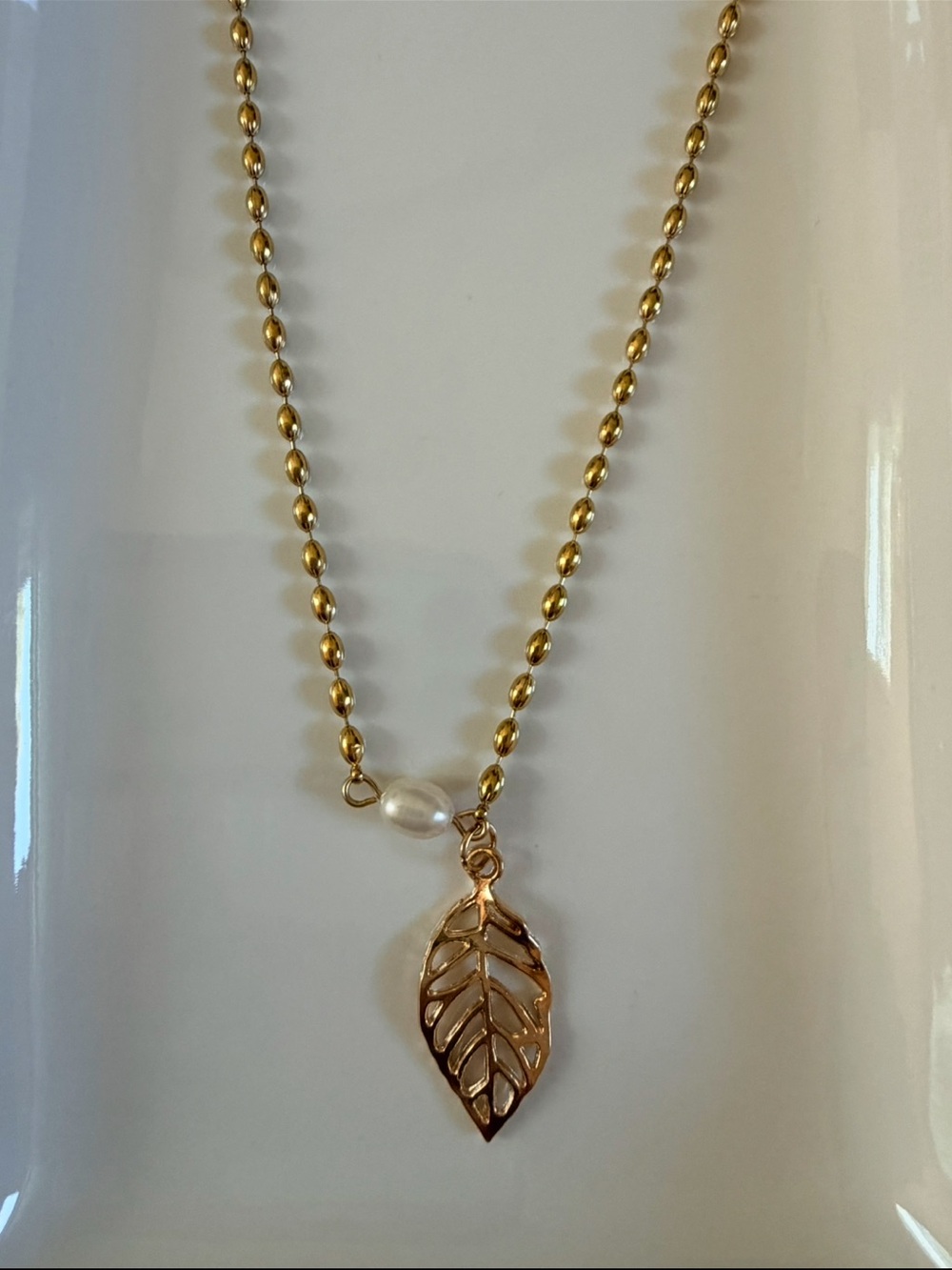 Gold Leaf Pendant Necklace with Pearl Accent